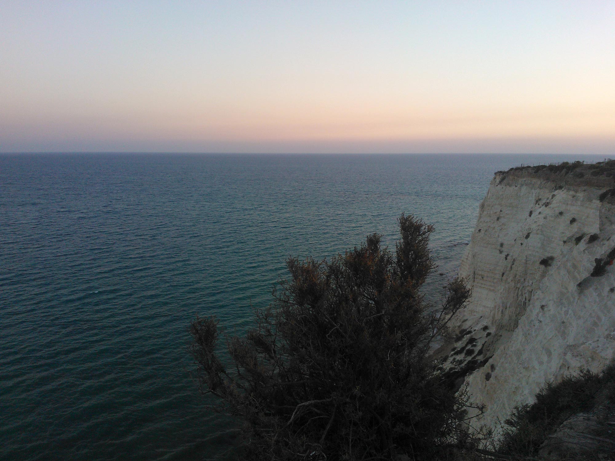 Sicily coast cliff sunset