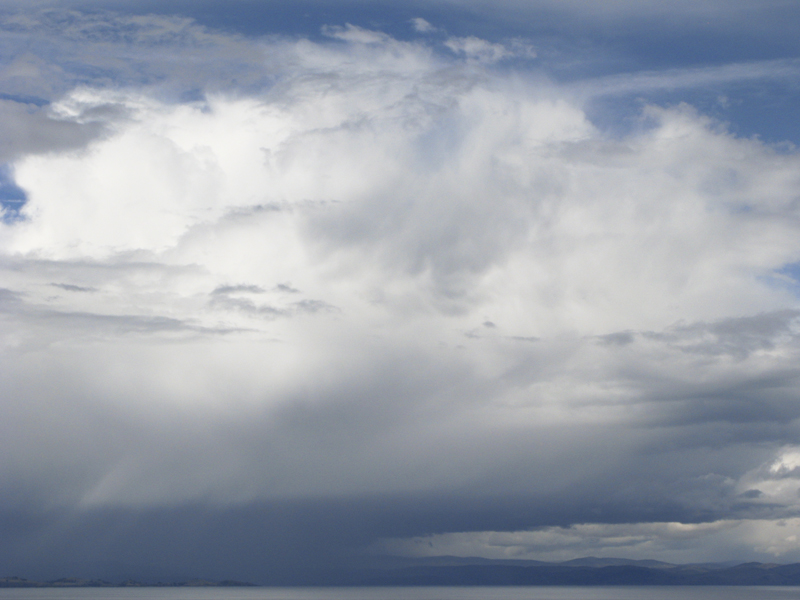 Peru Puno Titicaca ferry clouds