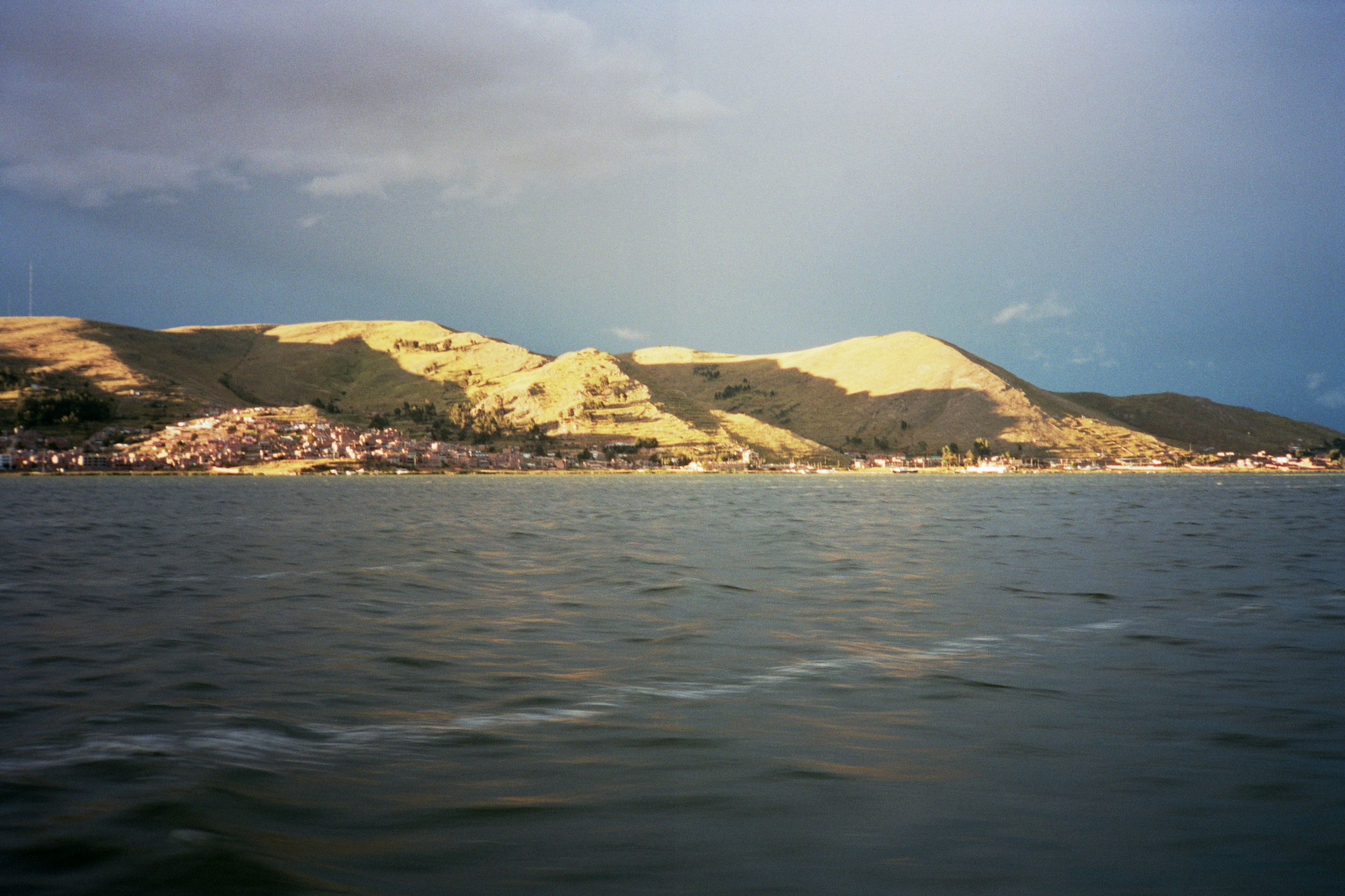 Peru Puno Titicaca ferry sunset