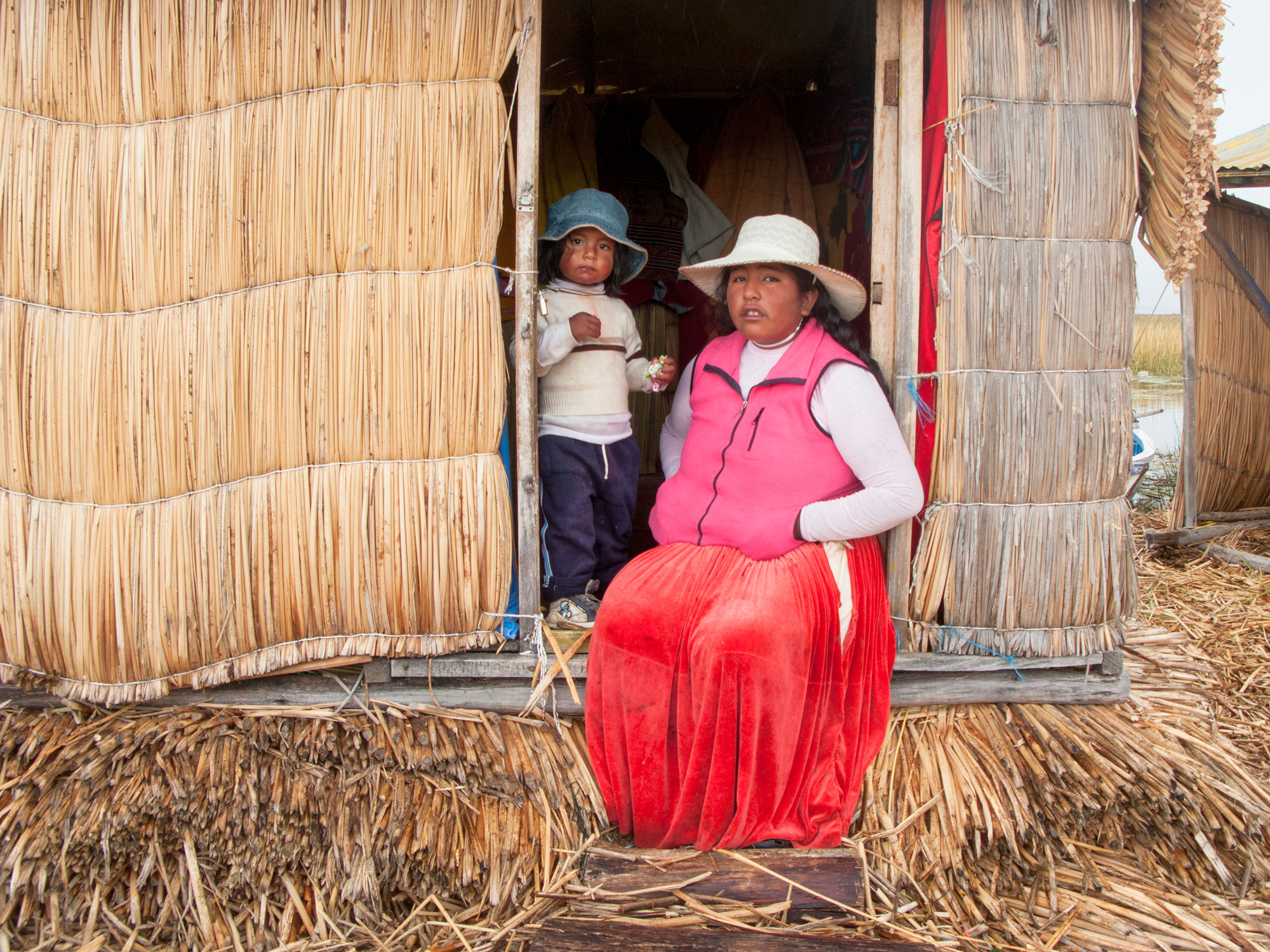 Peru Puno Titicaca ferry Uros island locals