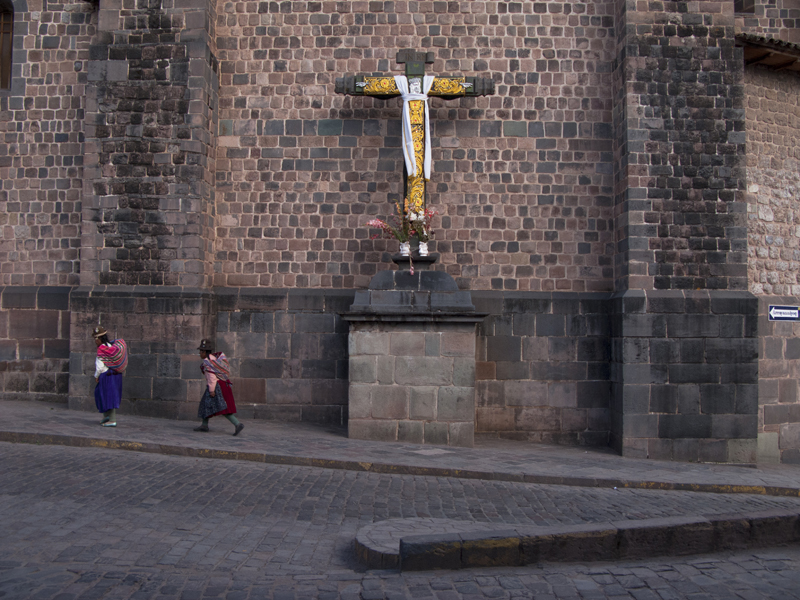 Peru cusco traditional peruvians walking near Qorikancha