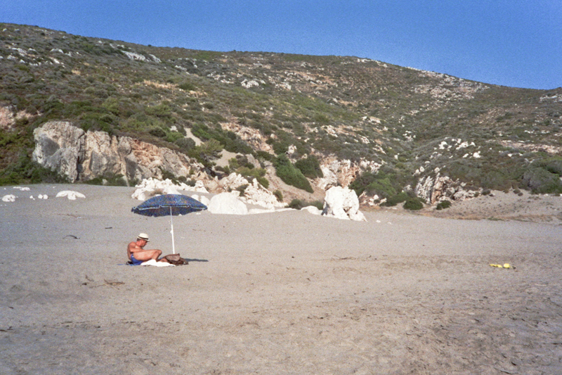 Turkey Patara beach man umbrella