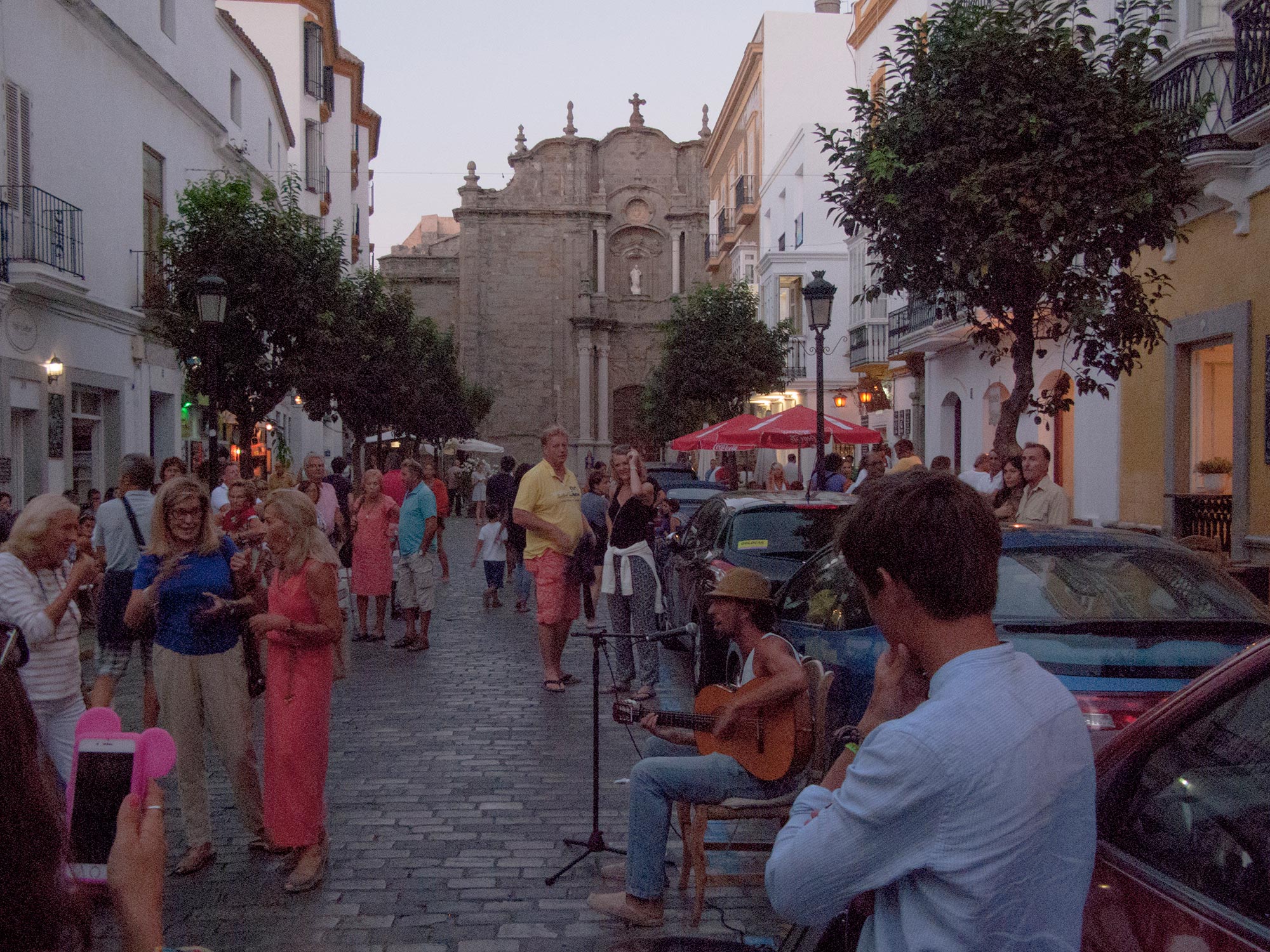 Tarifa street artist playing guitar