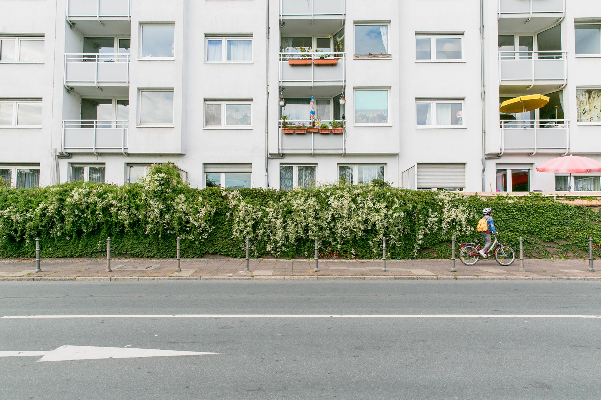 kid biking on frankfurt's street